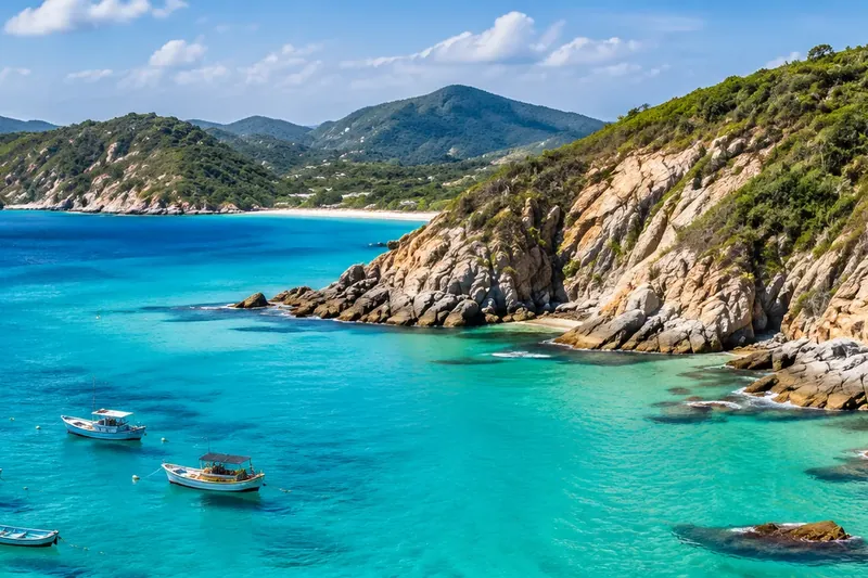Crystal-clear water and boats in Arraial do Cabo