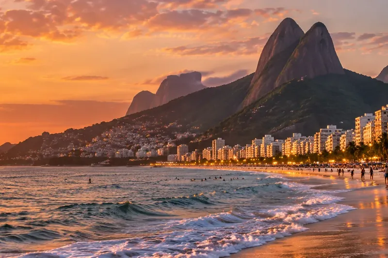 Sunset on Ipanema Beach with the Dois Irmãos peaks